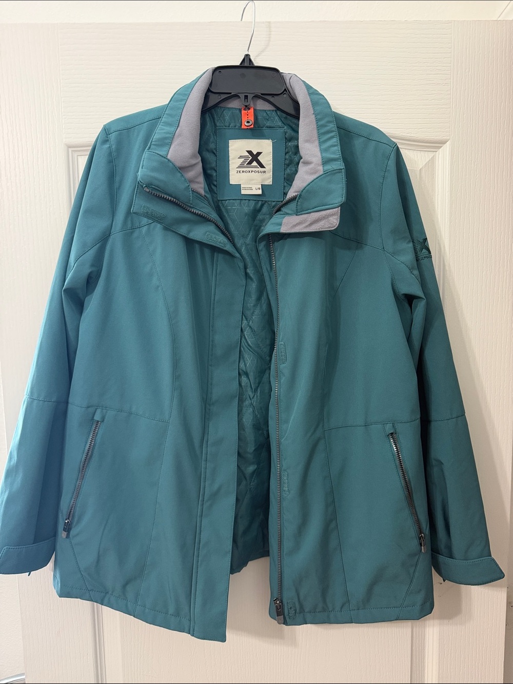 ZeroXposur Women's Teal Waterproof Jacket with Gray Trim